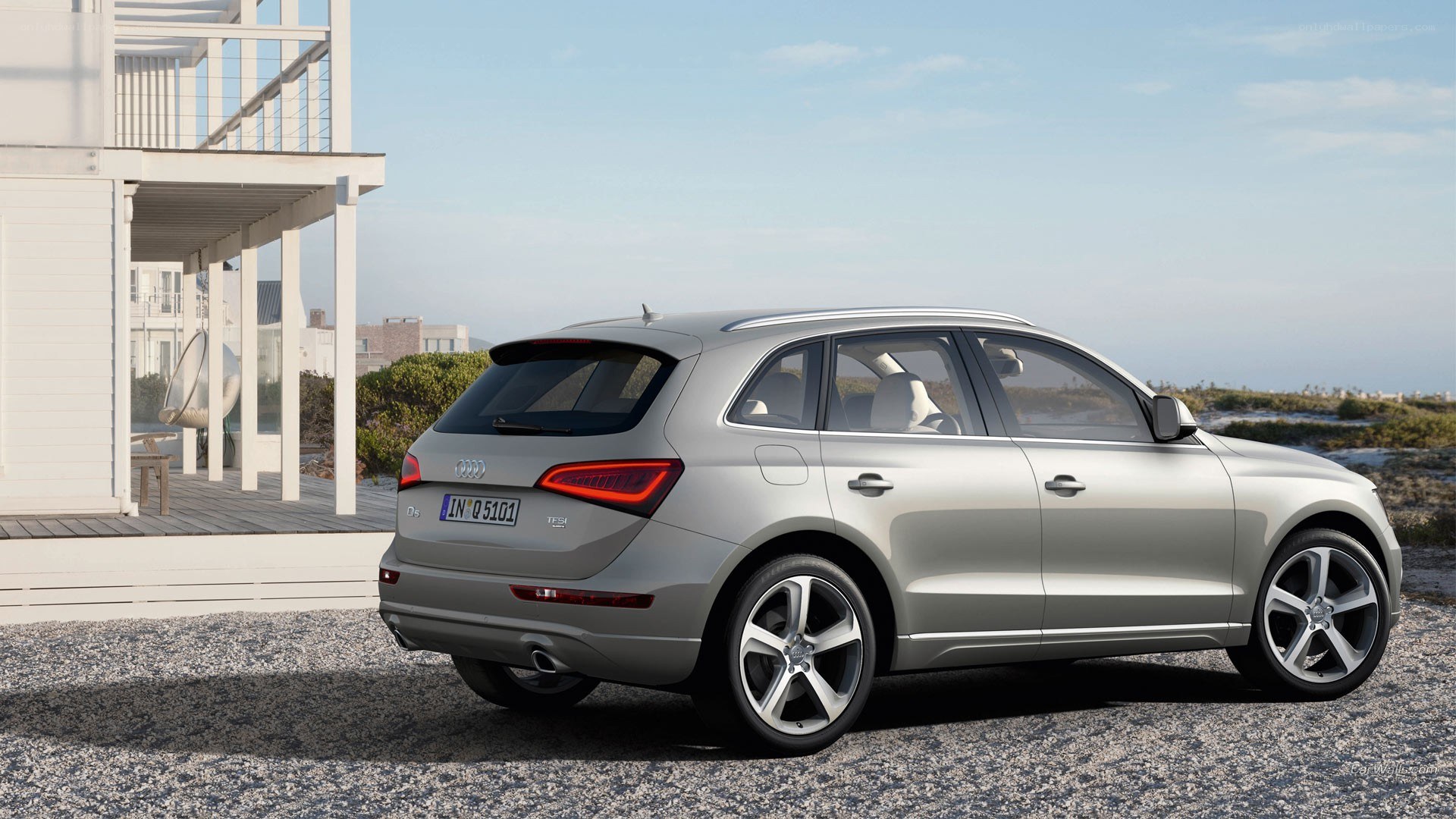 Silver Audi Q5 by the coast