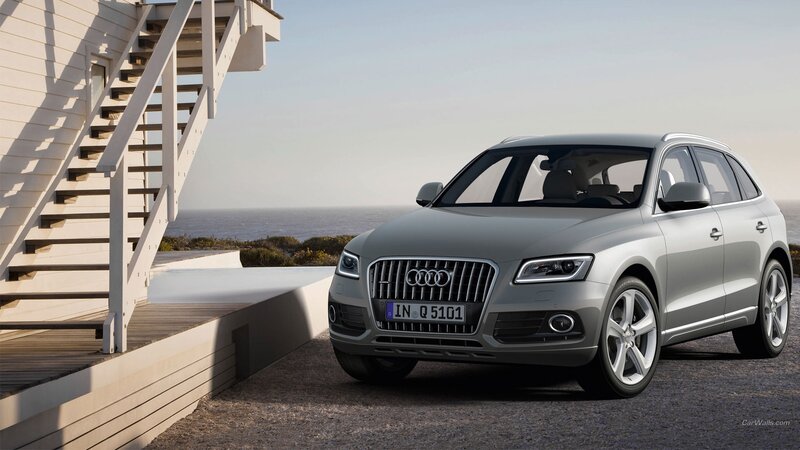 Silver Audi Q5 by the sea