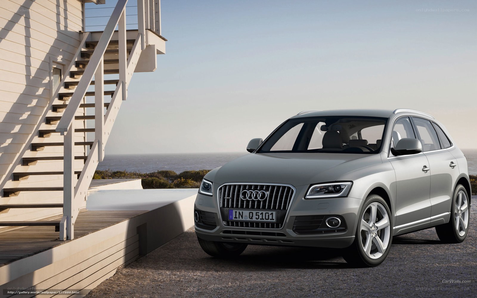 Silver Audi Q5 by the sea