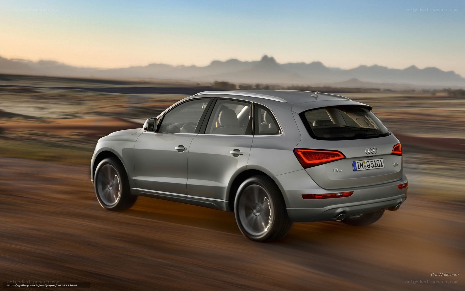 silver audi q5 in motion