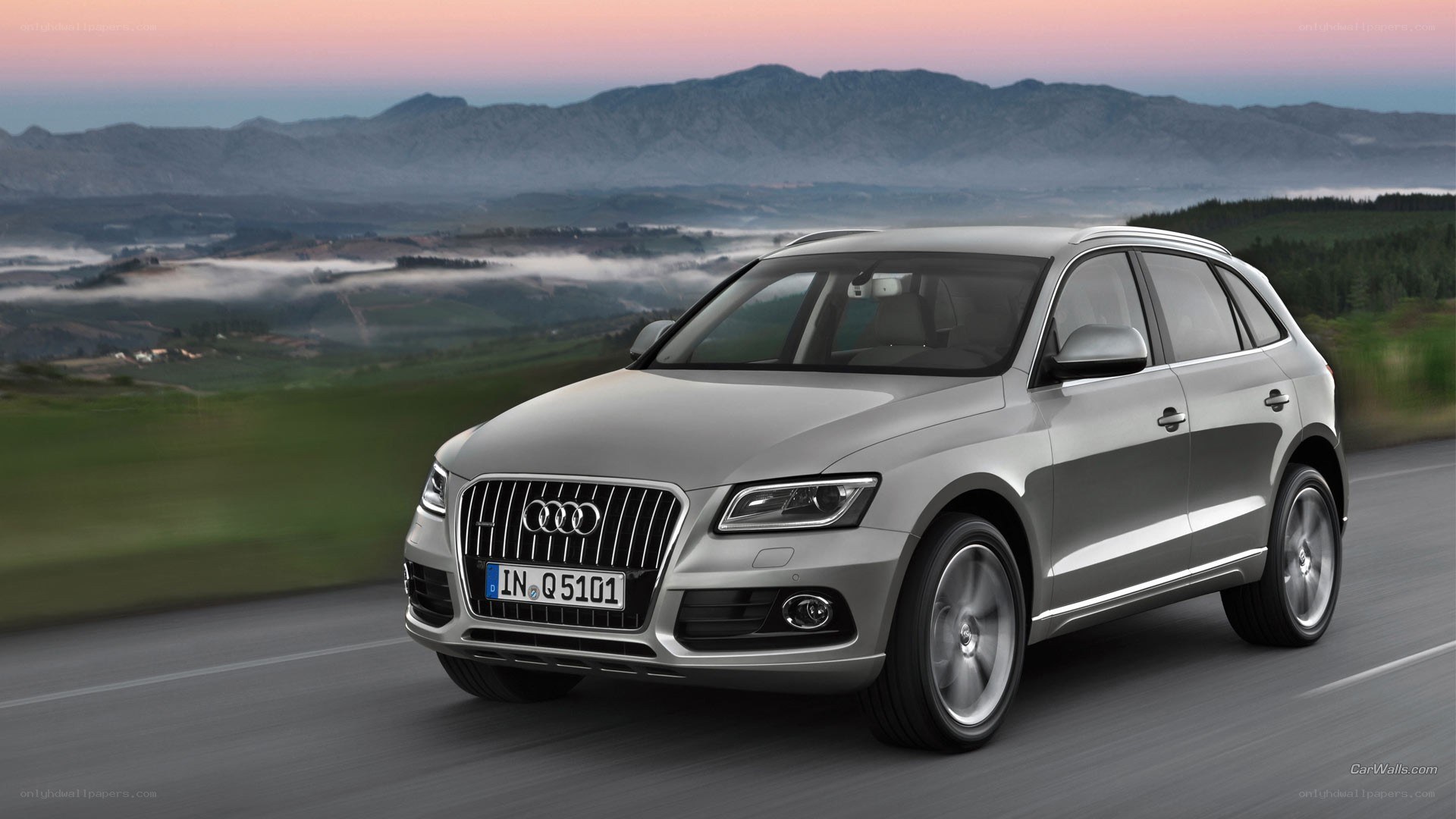 silver audi q5 on a scenic road