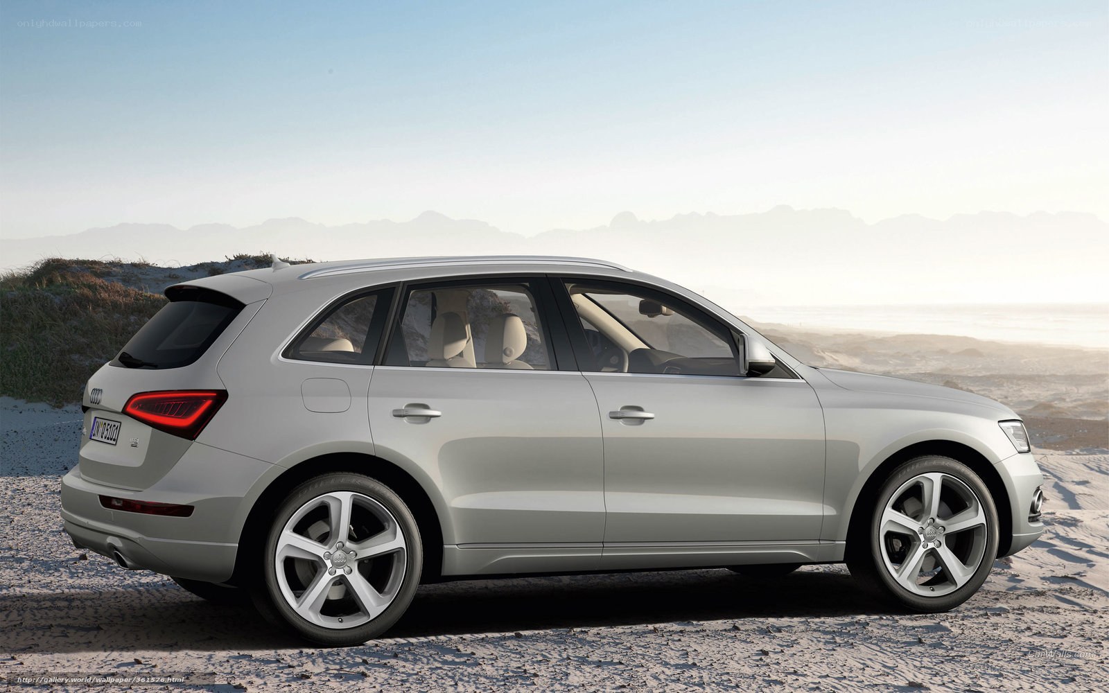 silver audi q5 on beach