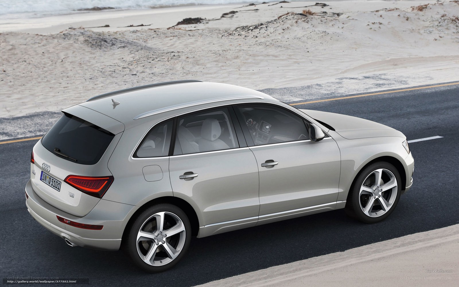 silver audi q5 on coastal road