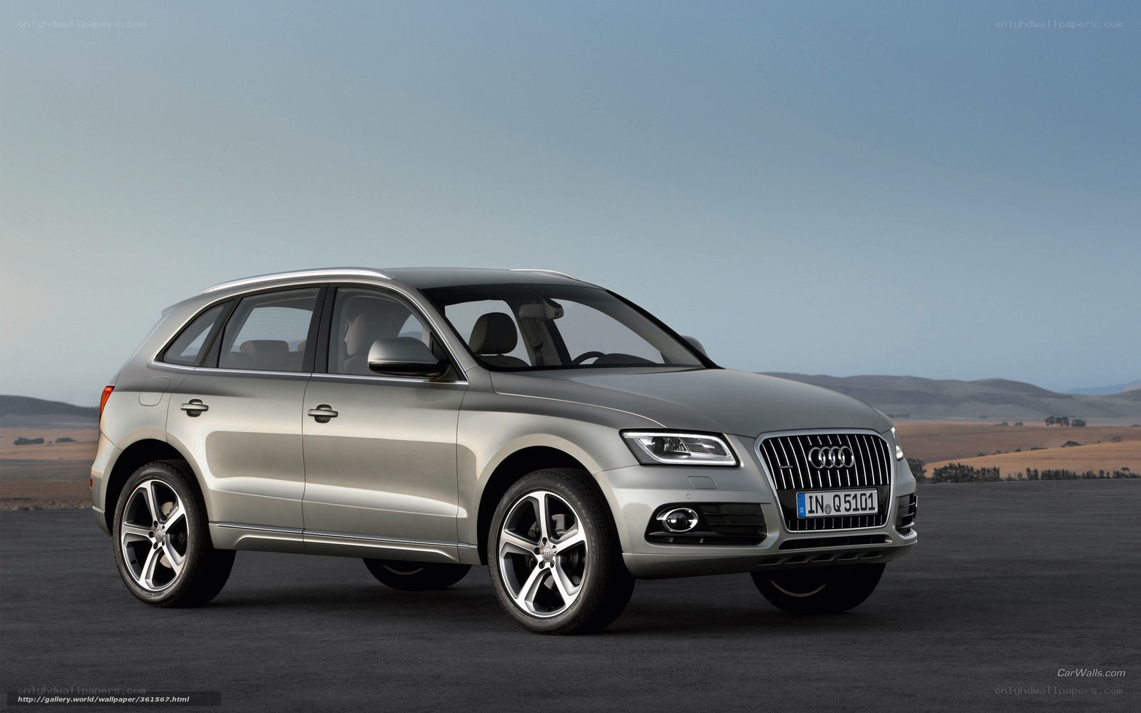 Silver Audi Q5 on open road