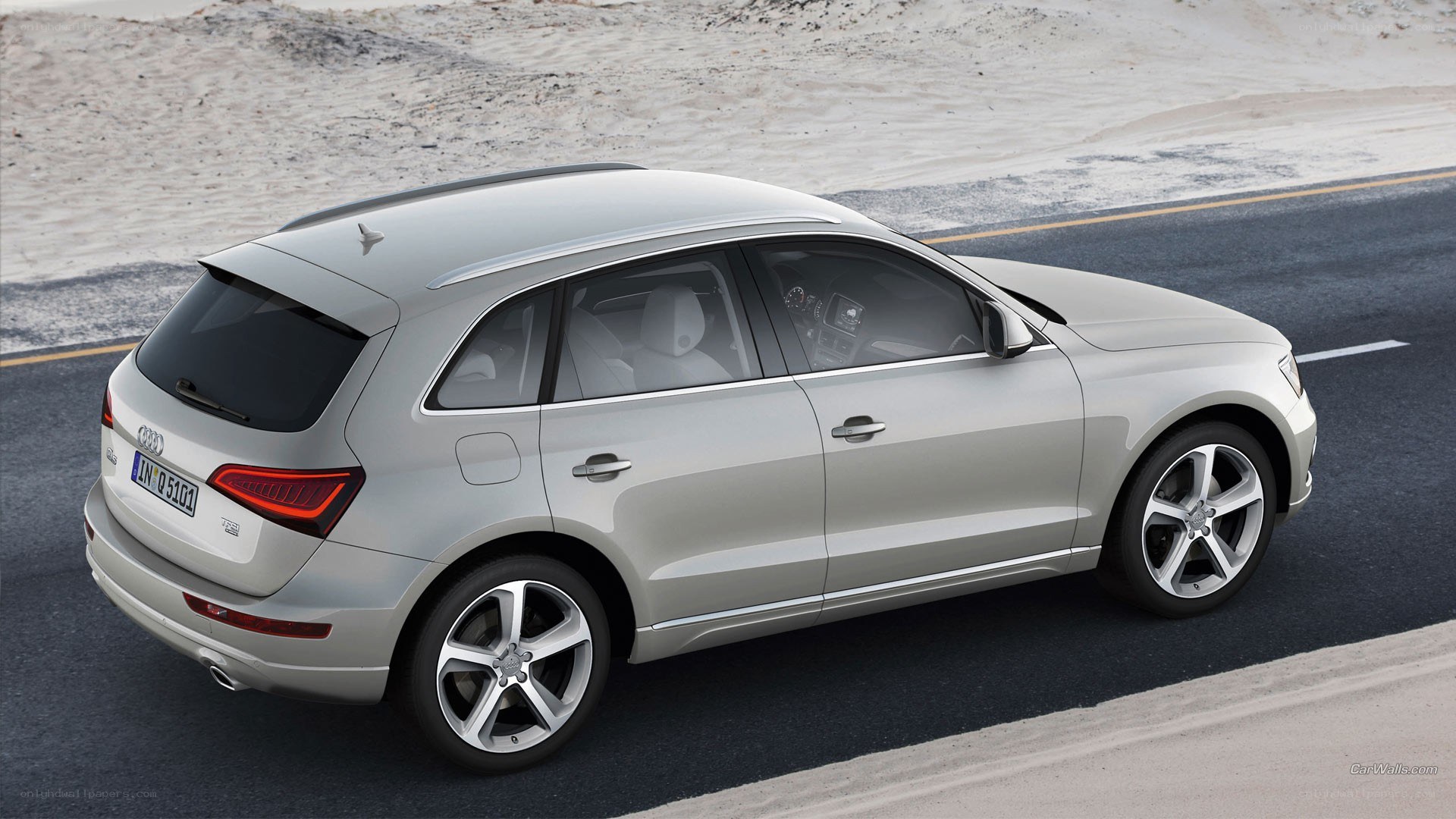 silver audi q5 on road
