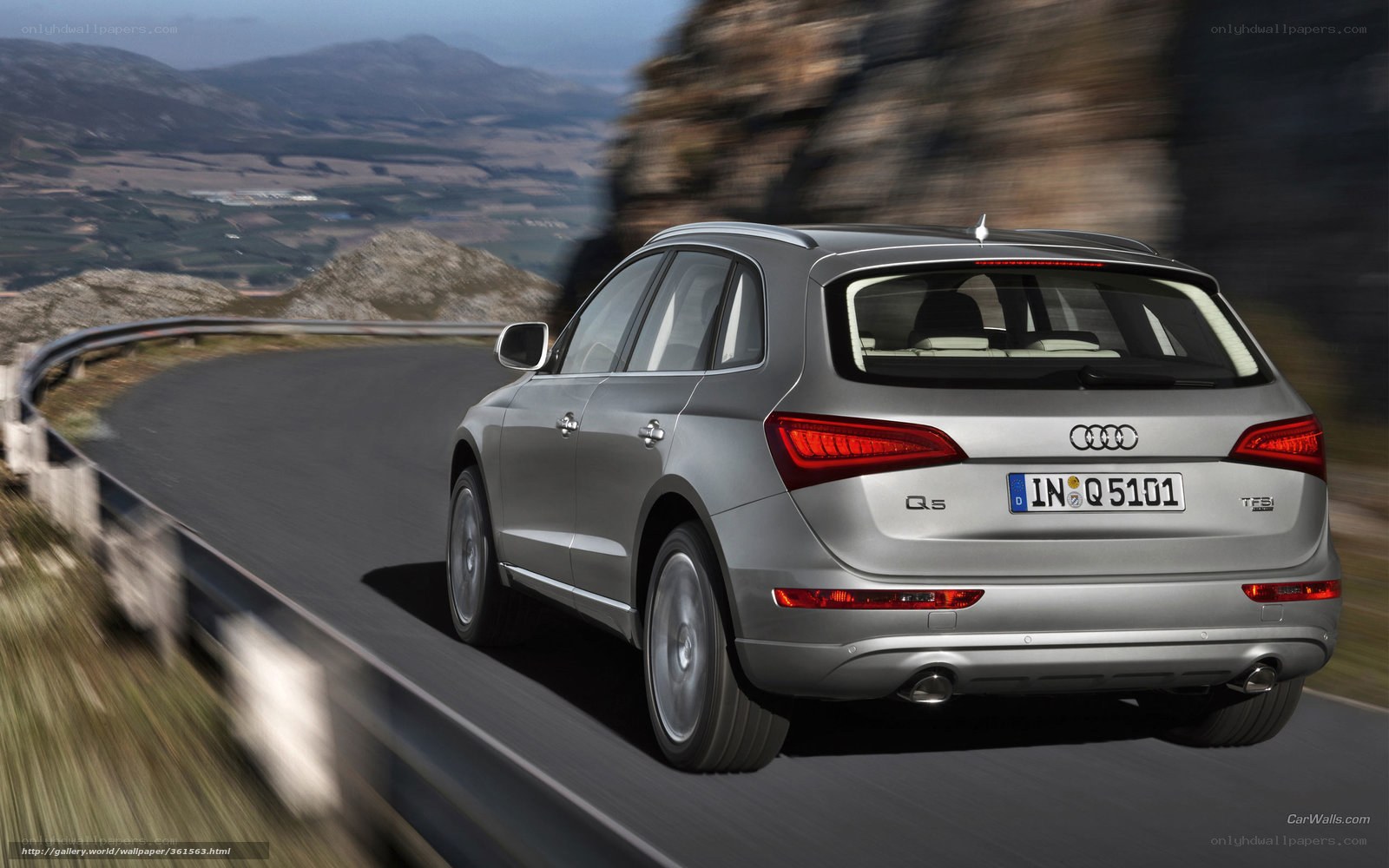 silver audi q5 on winding road