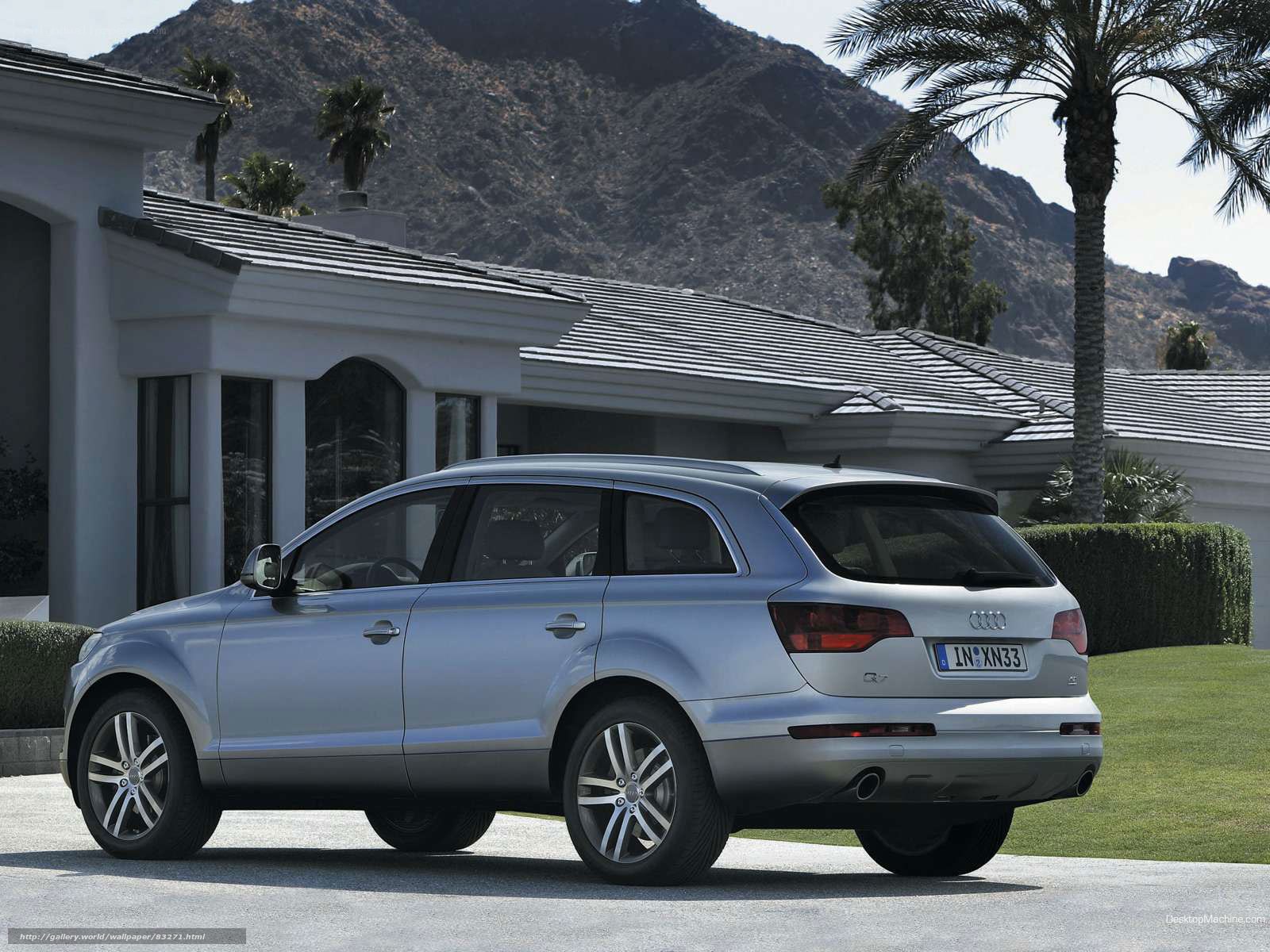 silver audi q7 parked outside house