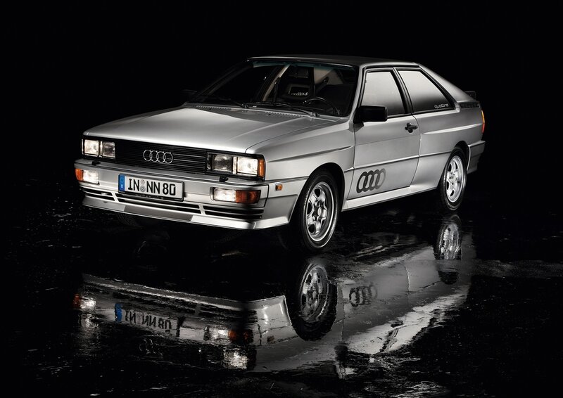 Silver Audi Quattro on wet surface