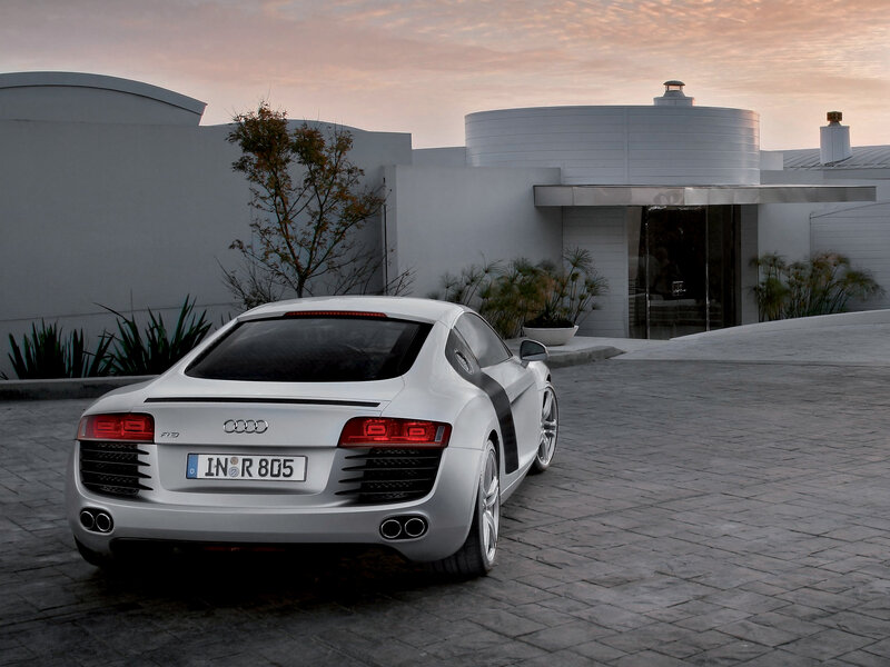 Silver Audi R8 at modern home
