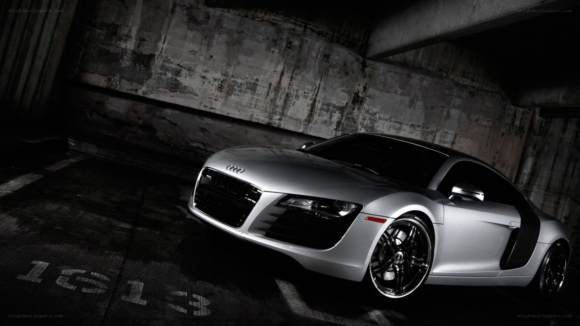 Silver Audi R8 in a garage