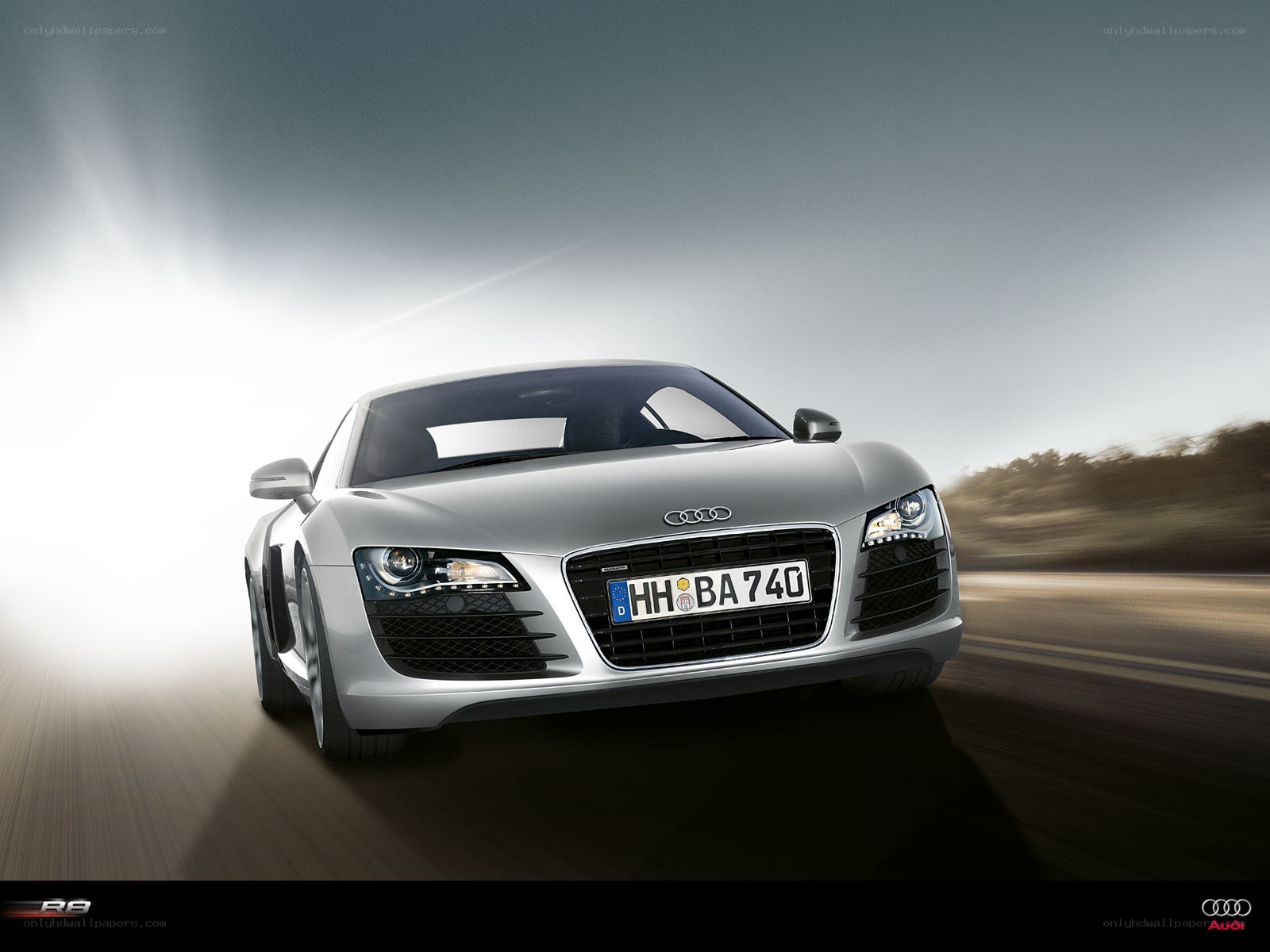 silver audi r8 in motion