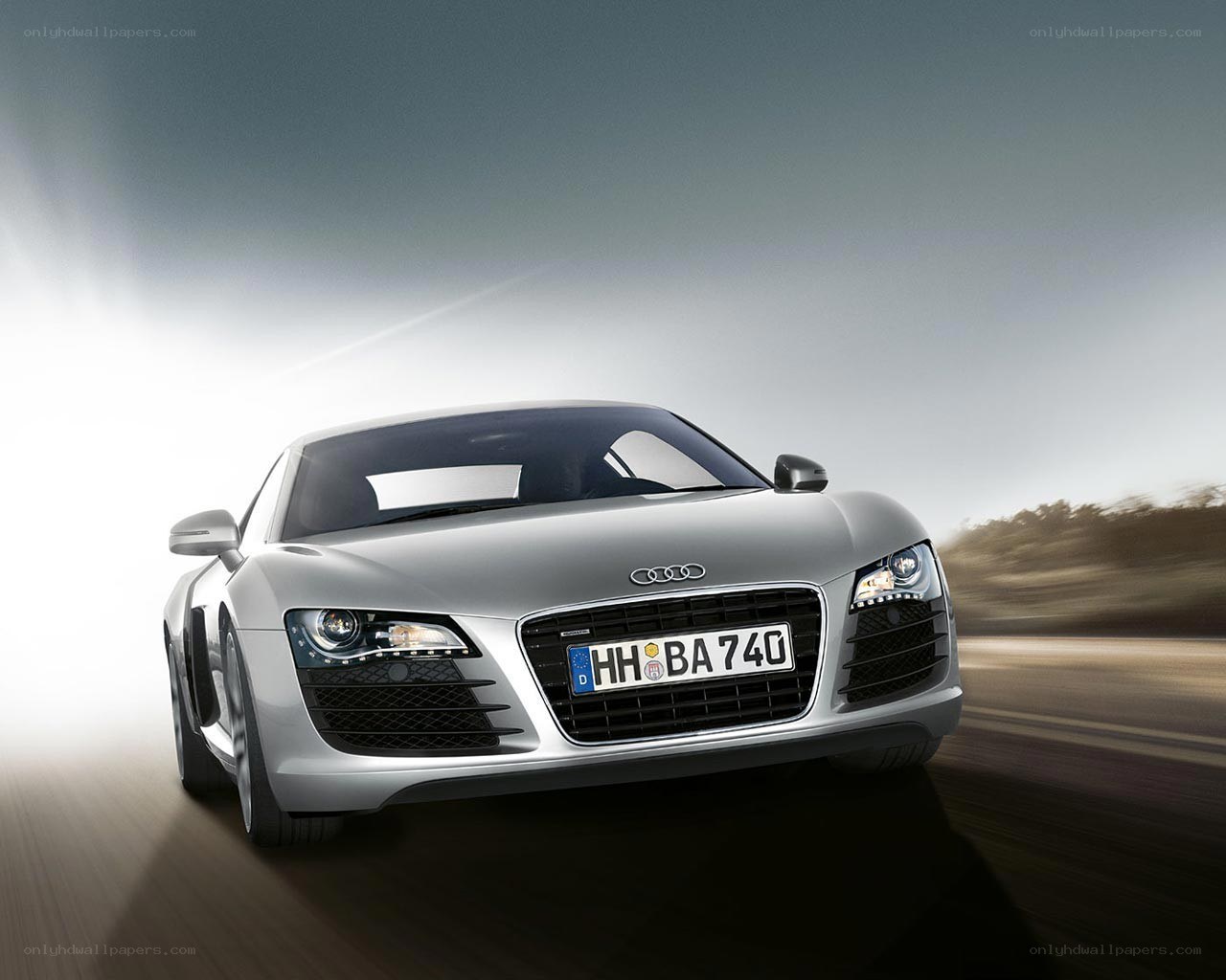silver audi r8 in motion