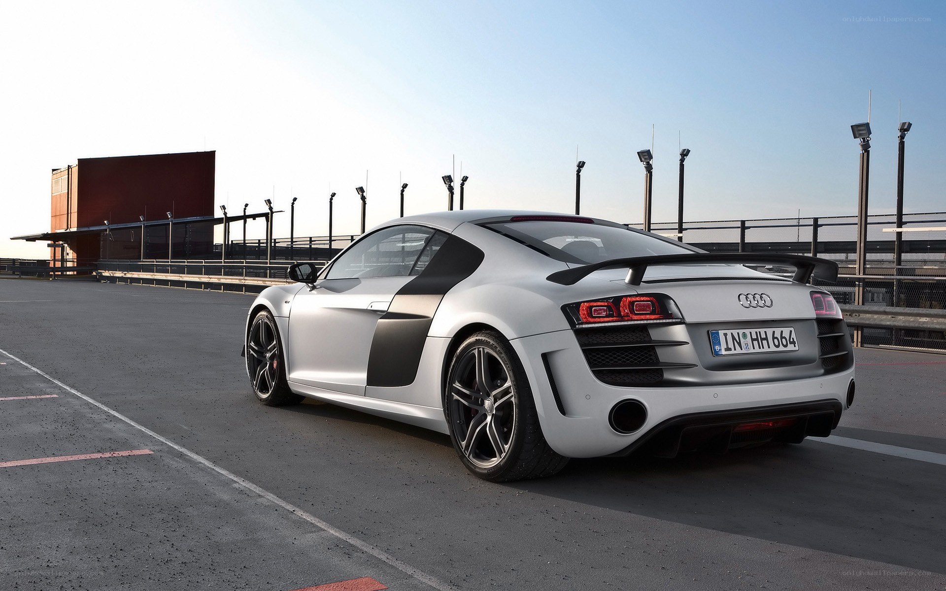 Silver Audi R8 on a racetrack