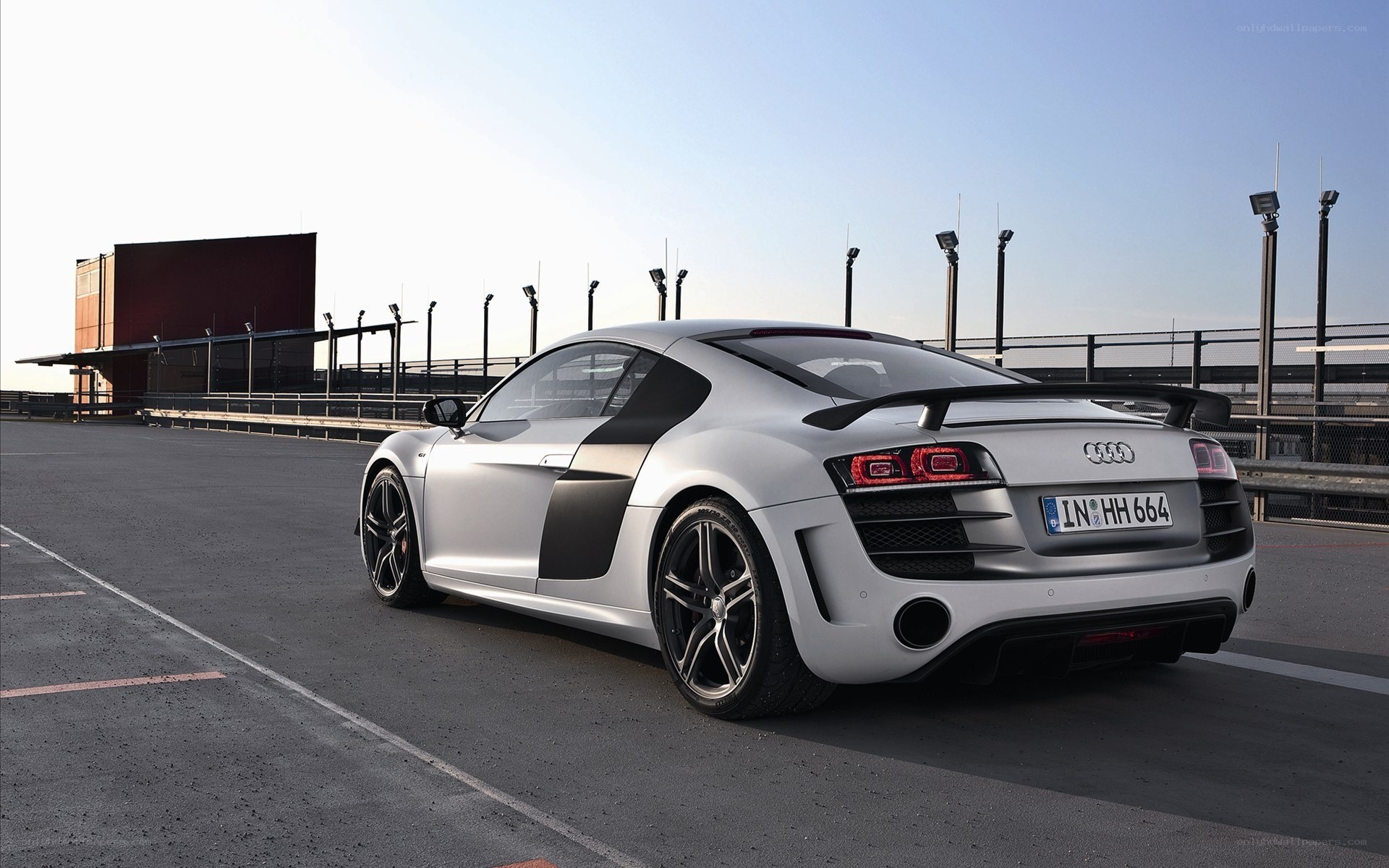 Silver Audi R8 on a racetrack