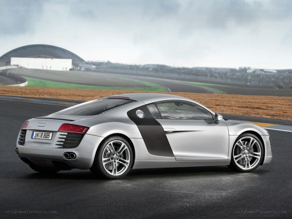 Silver Audi R8 on a racetrack