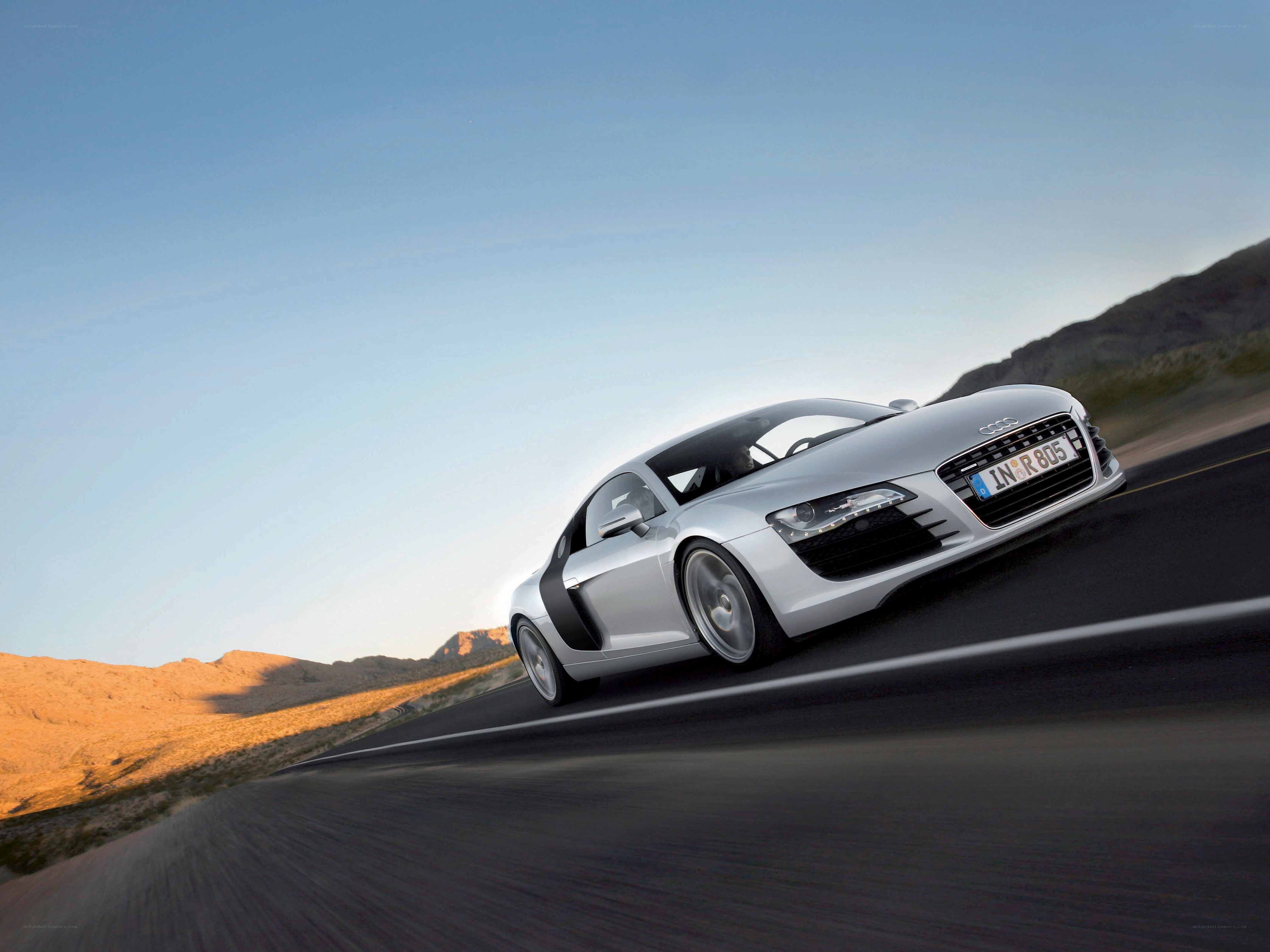 Silver Audi R8 on desert road