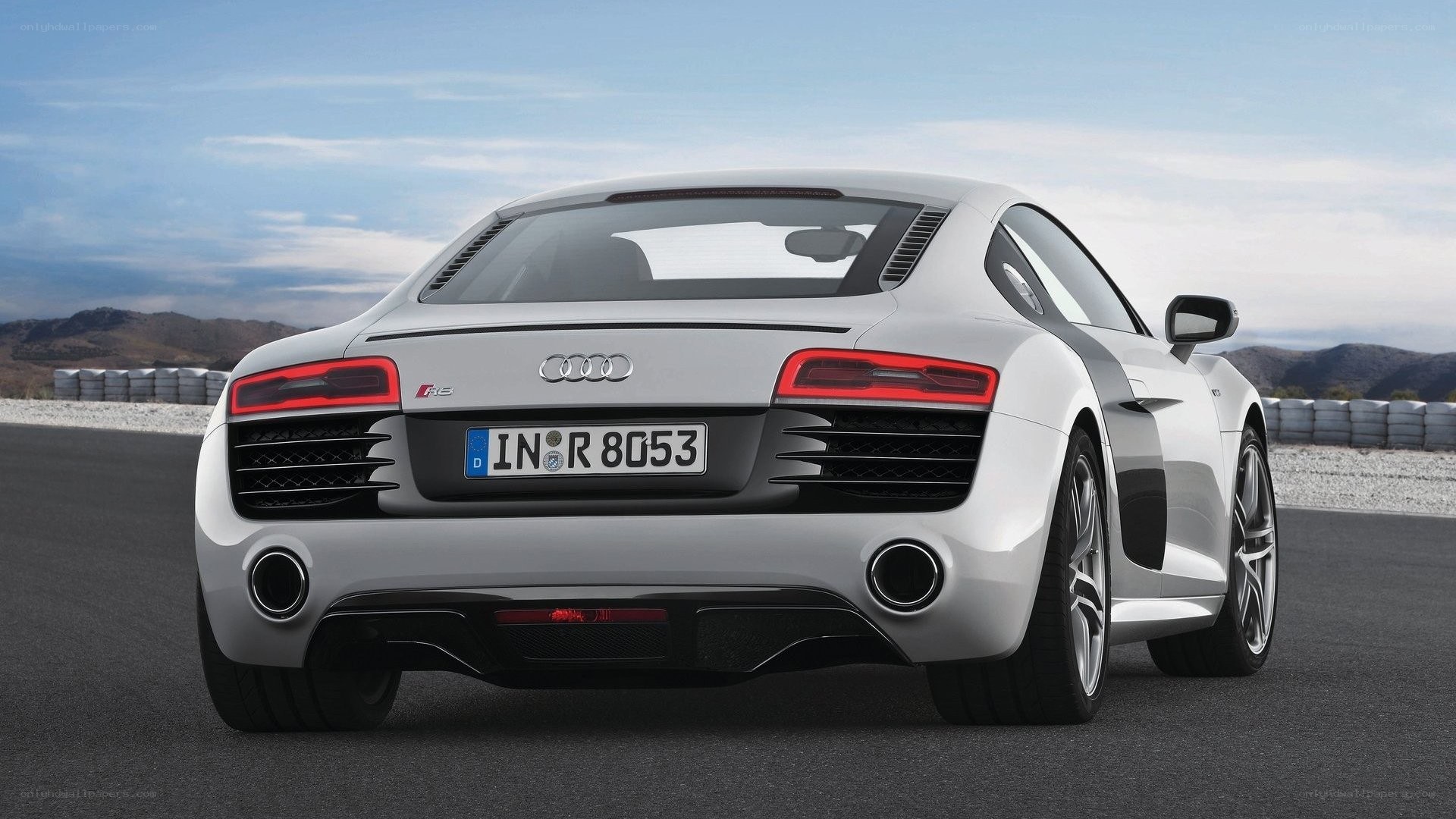 silver audi r8 on racetrack