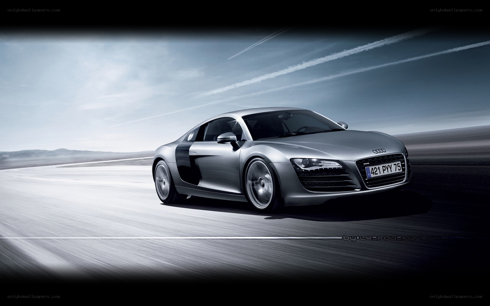 silver audi r8 on racetrack