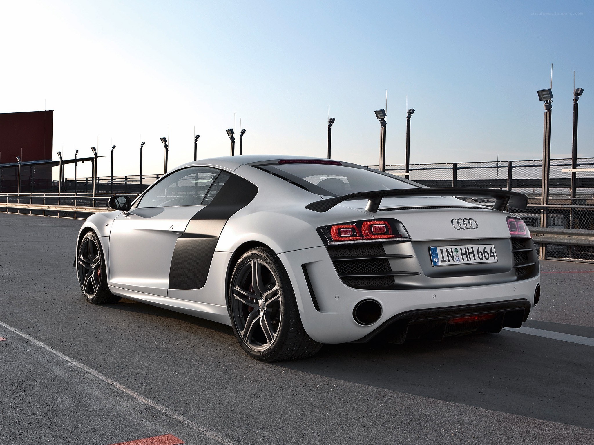 silver audi r8 on racetrack