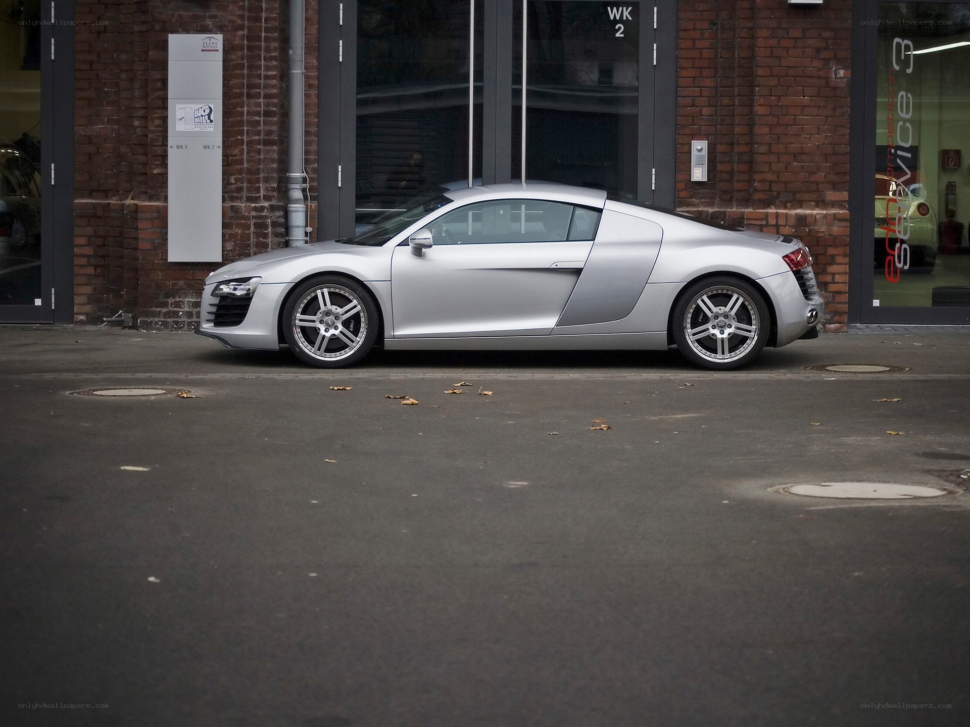 silver audi r8 parked outside