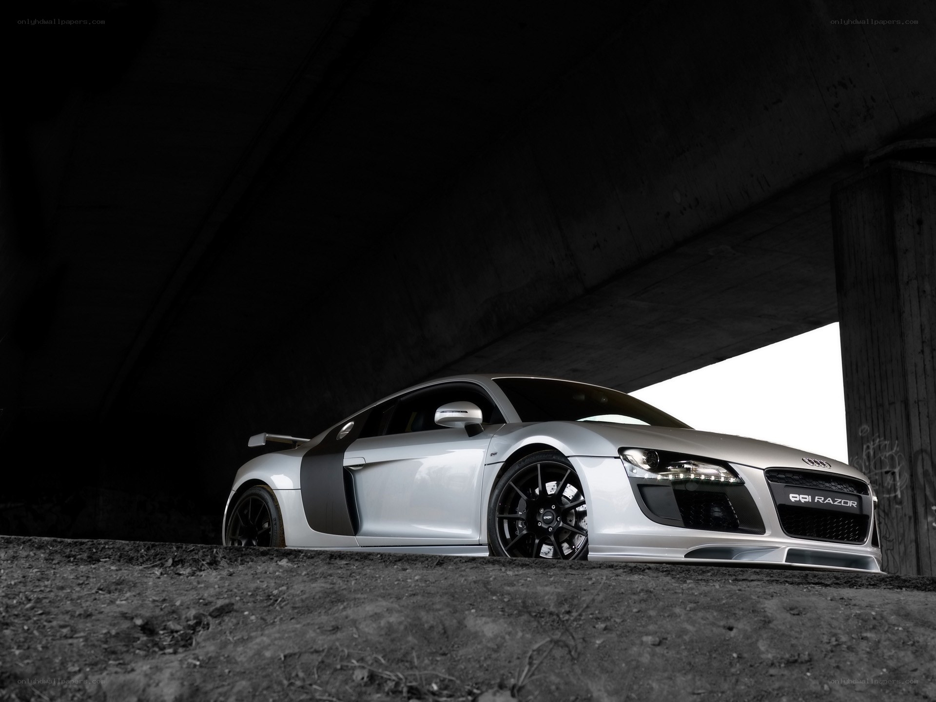 Silver Audi R8 under bridge