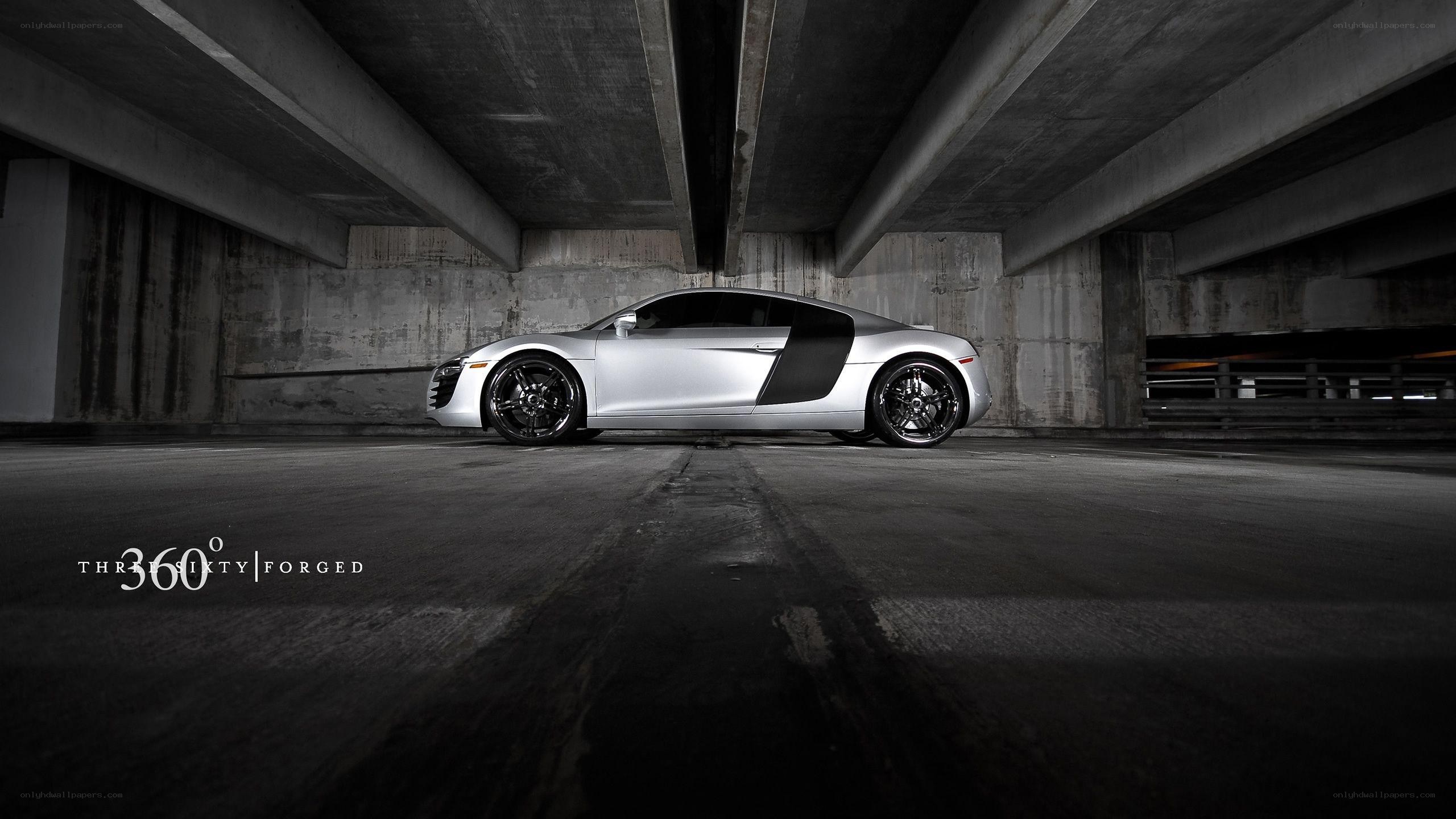 Silver Audi R8 under concrete overpass