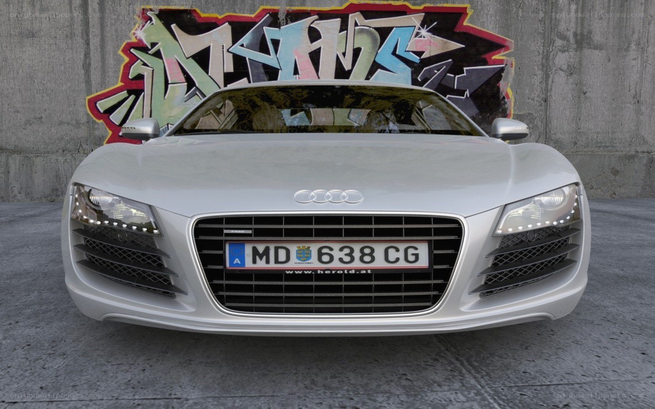 Silver Audi R8 with graffiti background