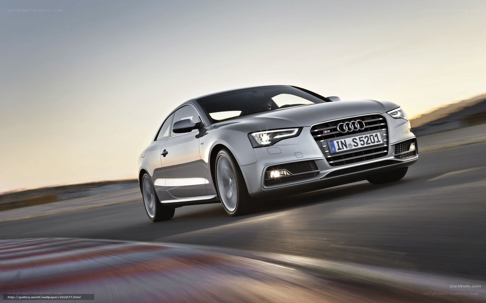 silver audi s5 coupe in motion