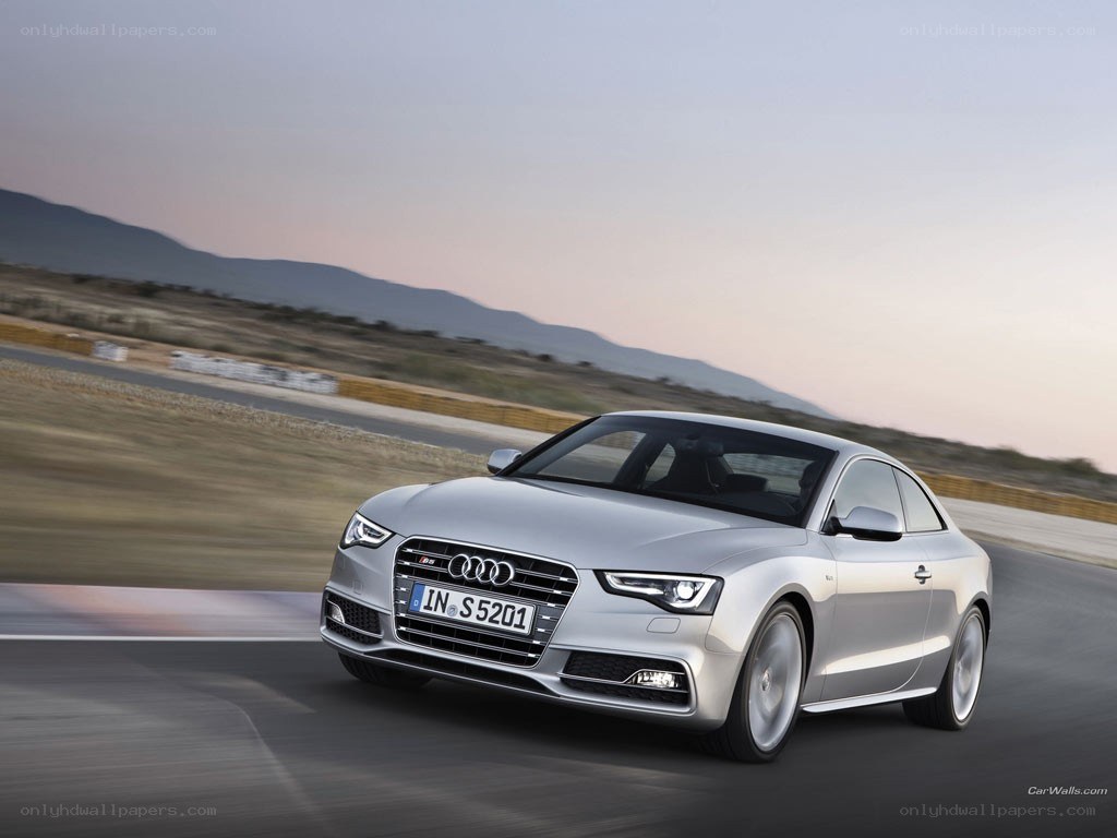 silver audi s5 coupe on track
