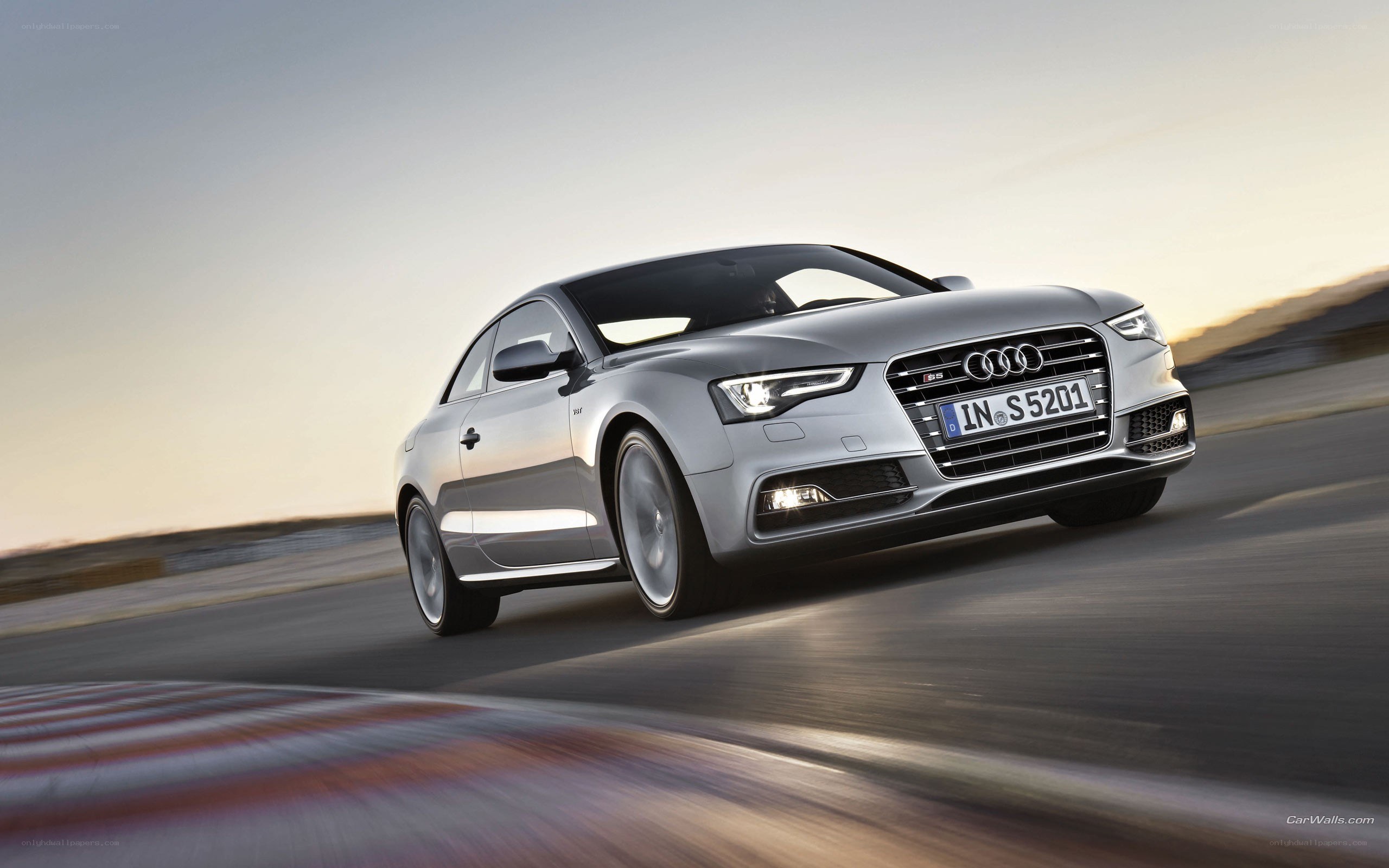 silver audi s5 in motion