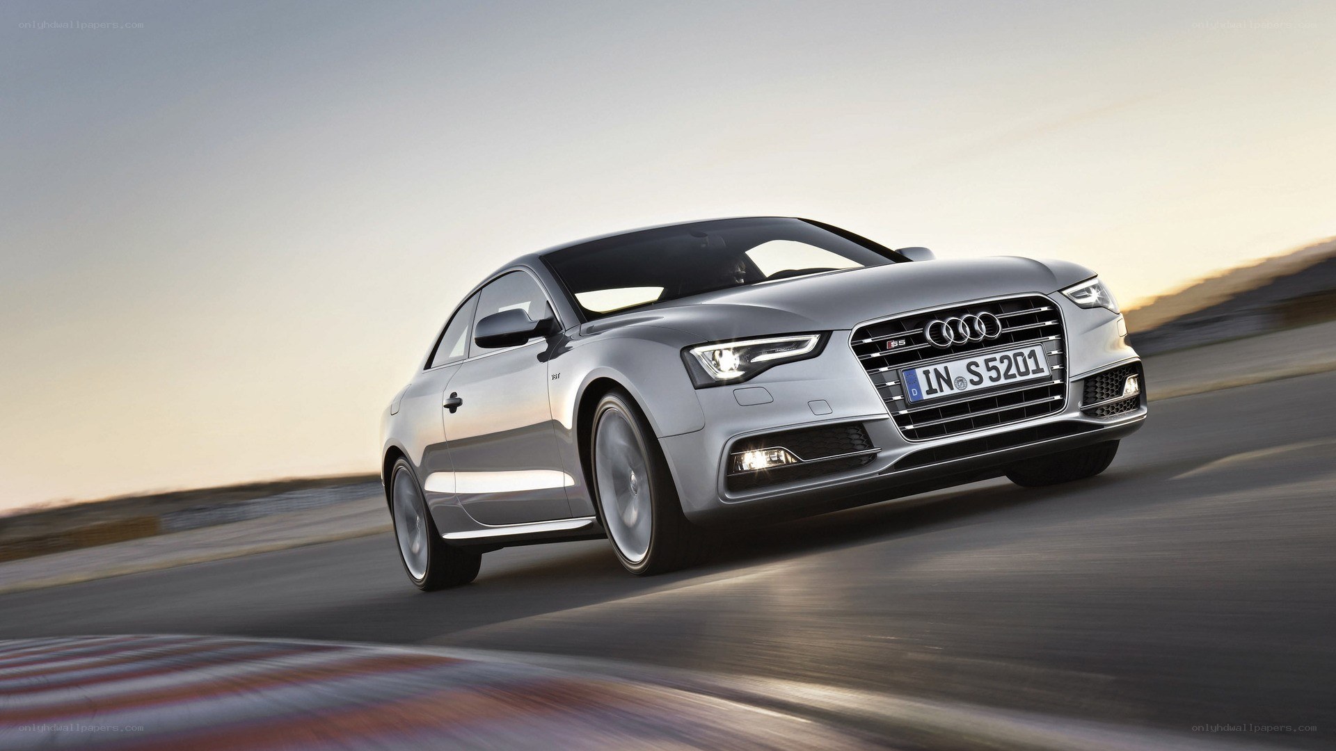 Silver Audi S5 in motion
