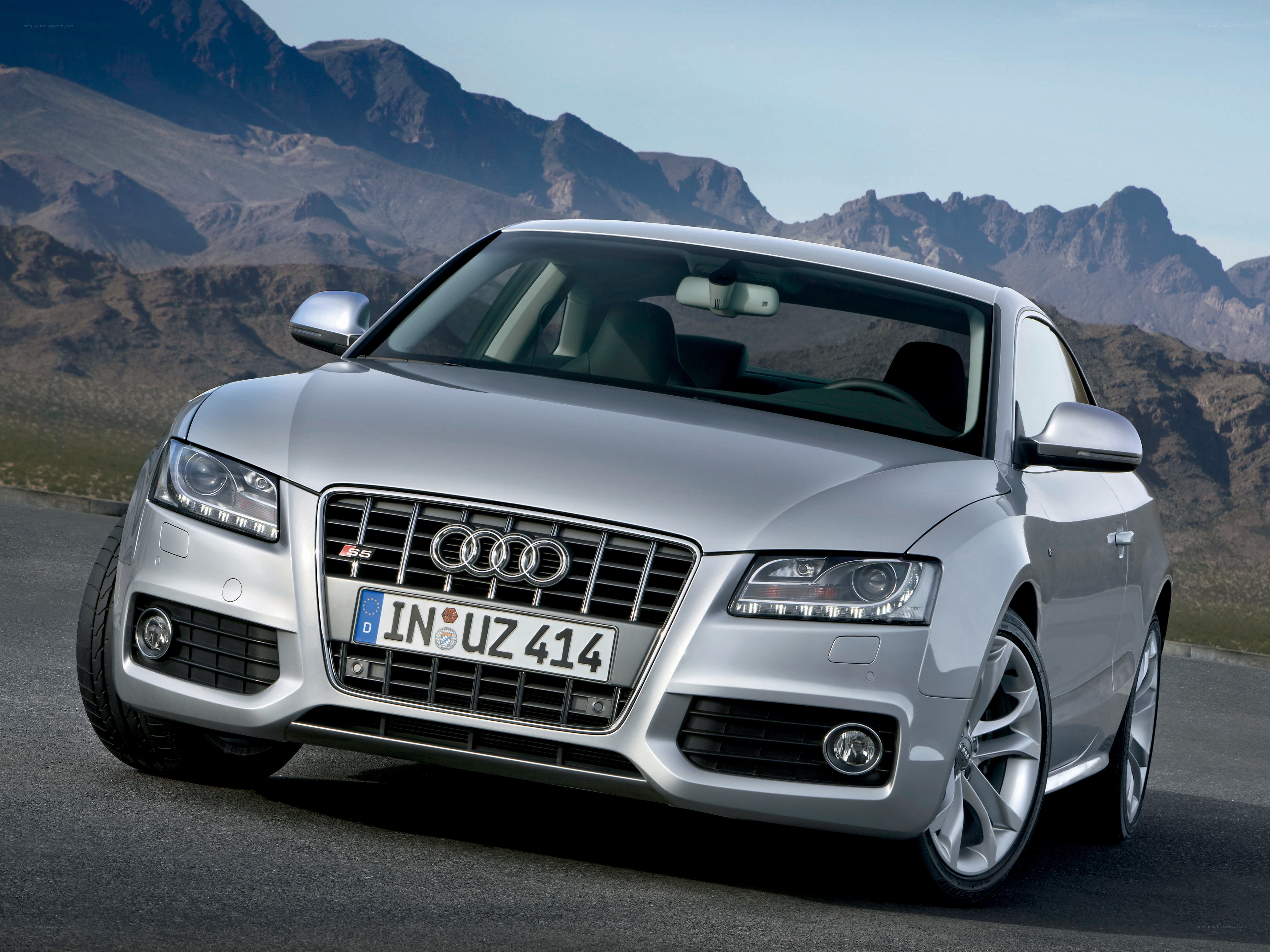Silver Audi S5 on mountain road