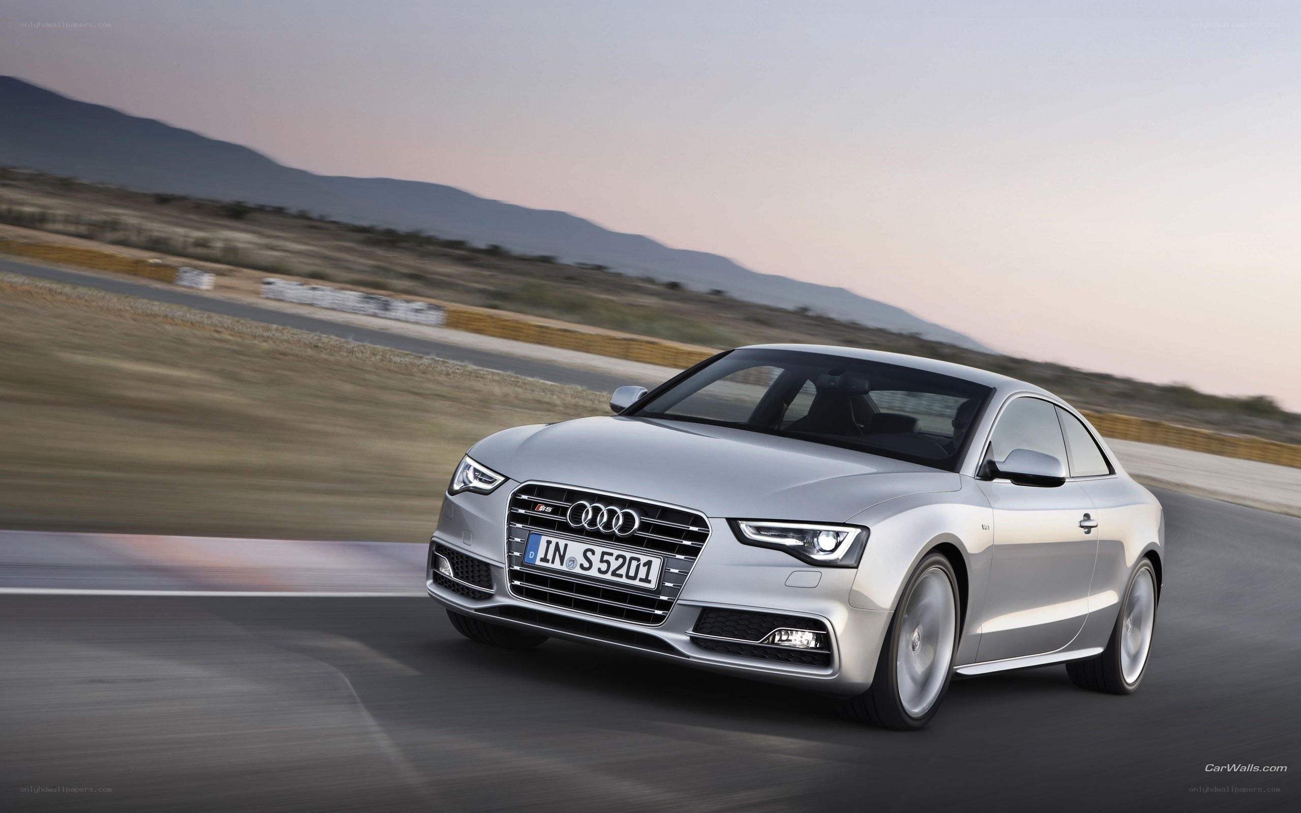 silver audi s5 on racetrack