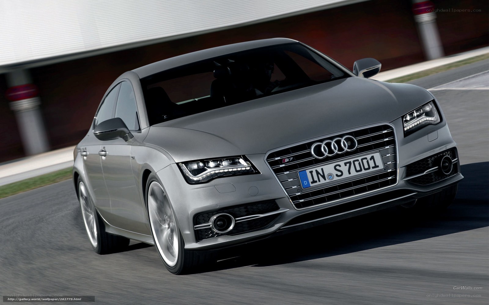 Silver Audi S7 on a racetrack
