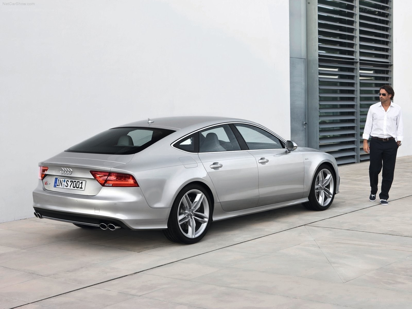 Silver Audi S7 parked outside