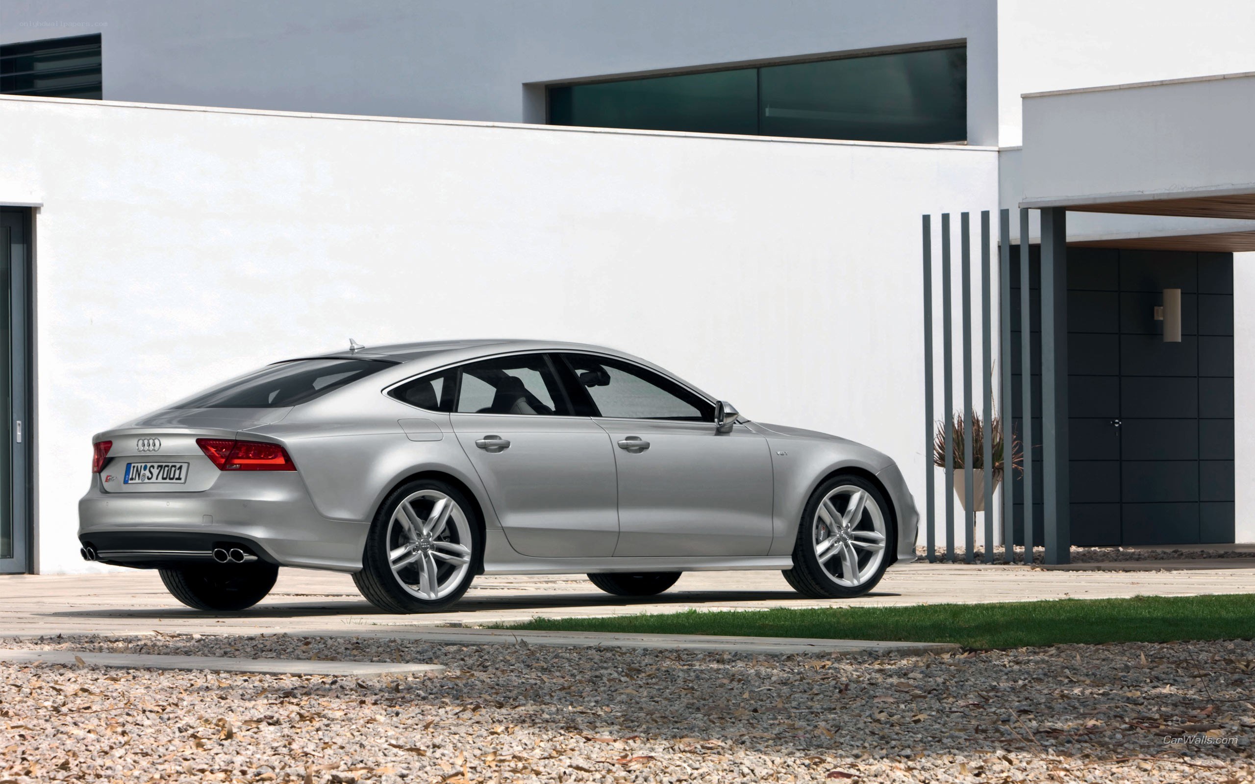Silver Audi S7 parked outside