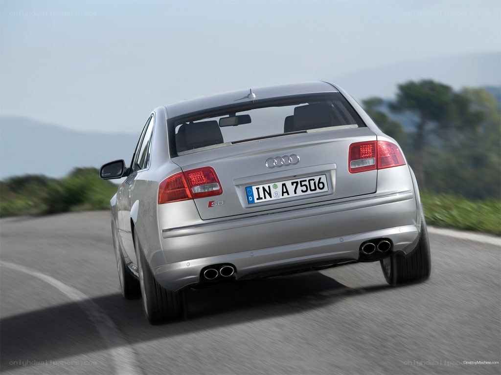 silver audi s8 driving on road