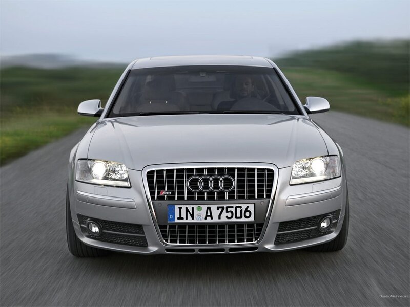 silver audi s8 driving on road
