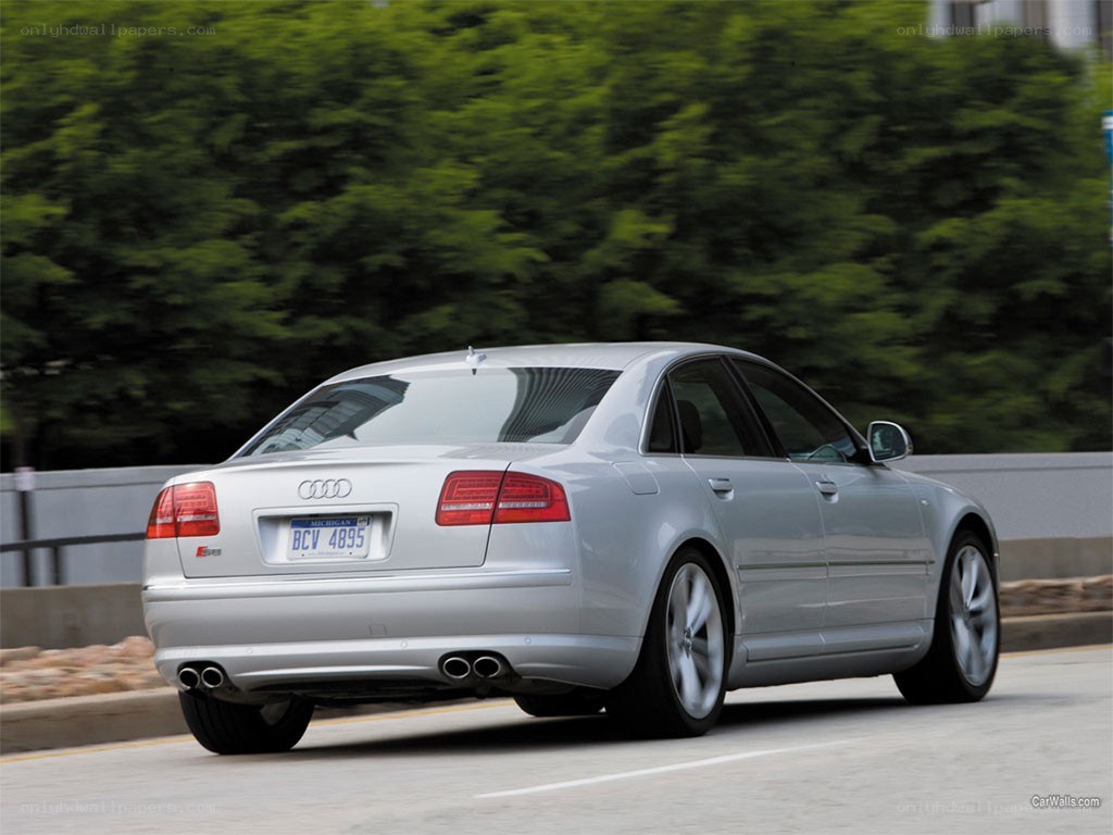 silver audi s8 driving on road