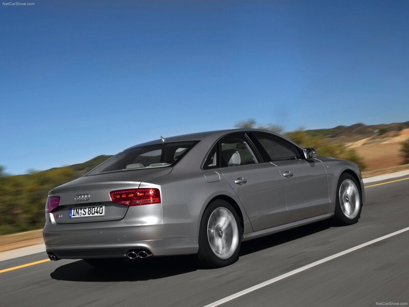 silver audi s8 driving on road