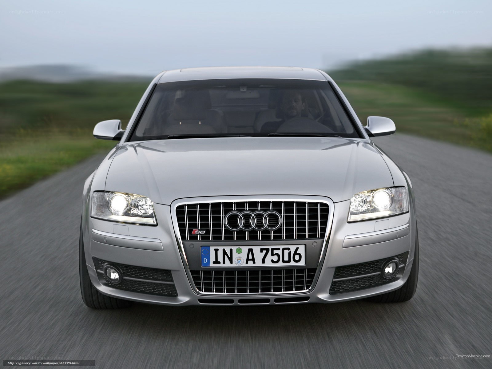 silver audi s8 driving on road