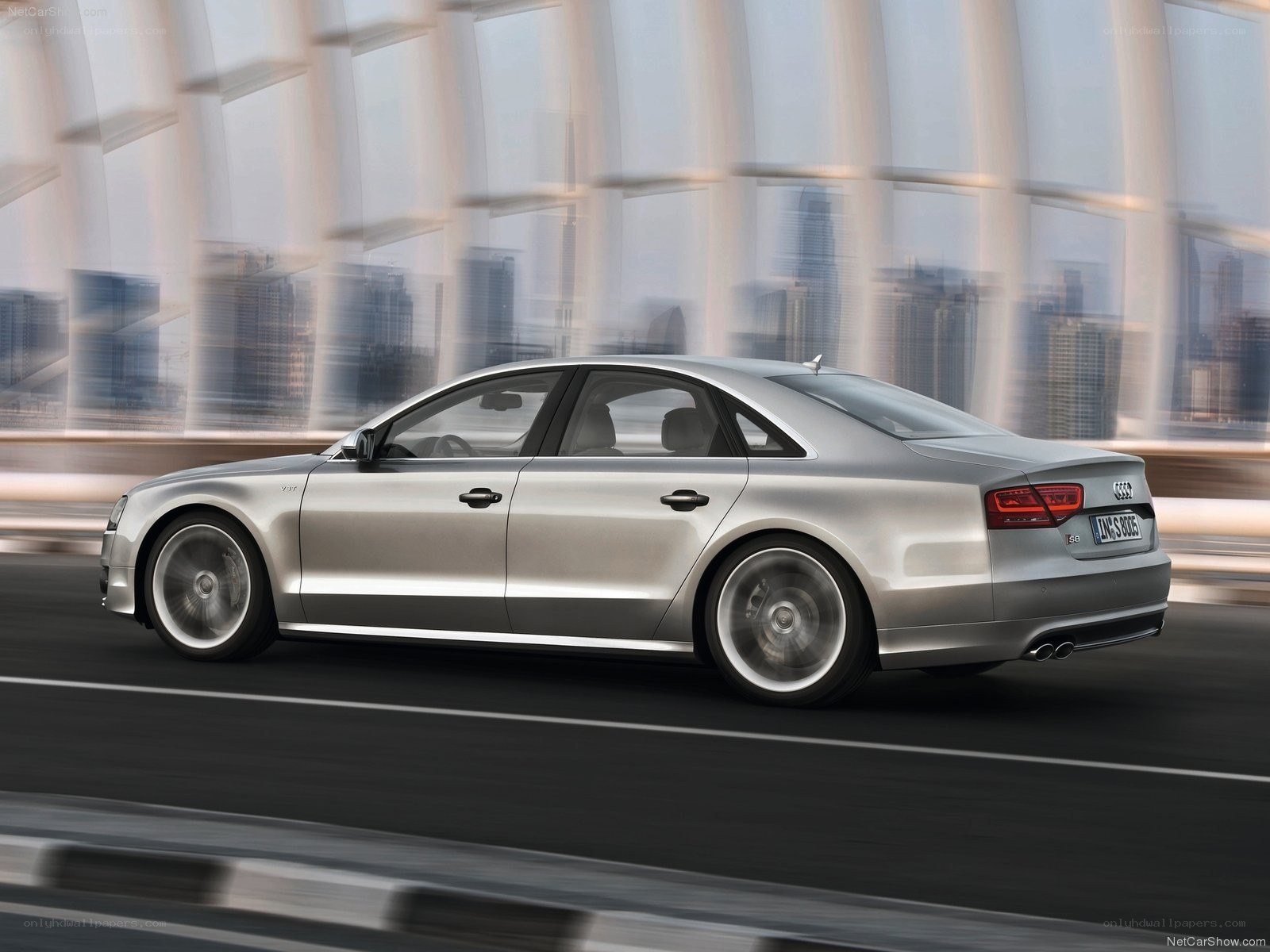 Silver Audi S8 in motion