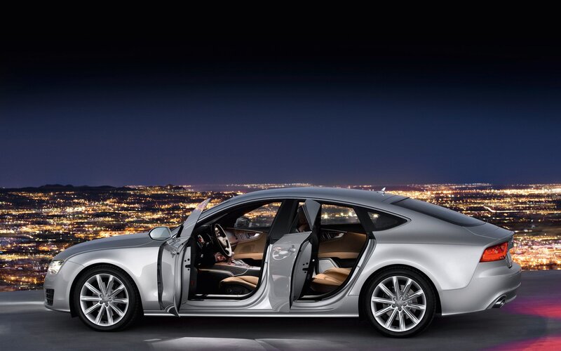 Silver Audi sedan at night