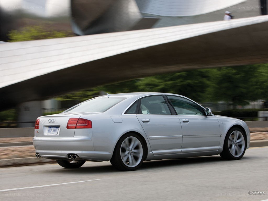 silver audi sedan in motion