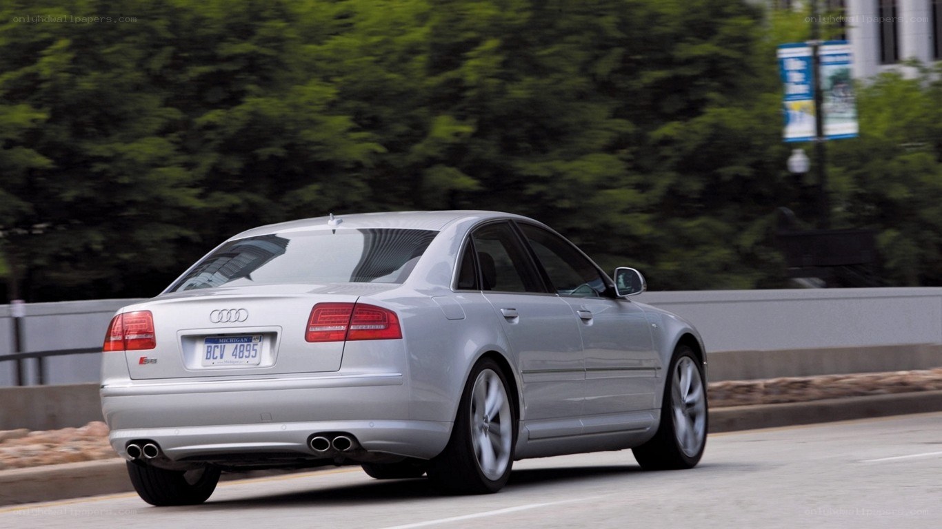 silver audi sedan in motion