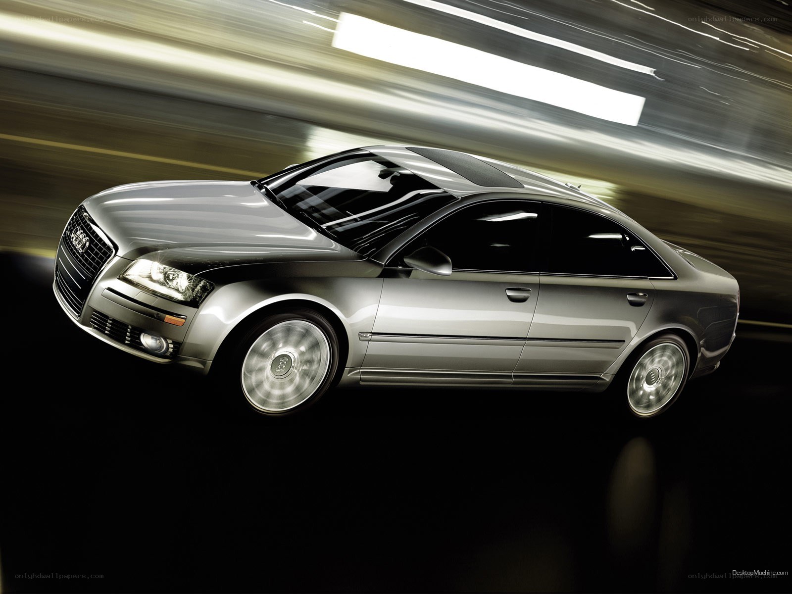 silver audi sedan in motion