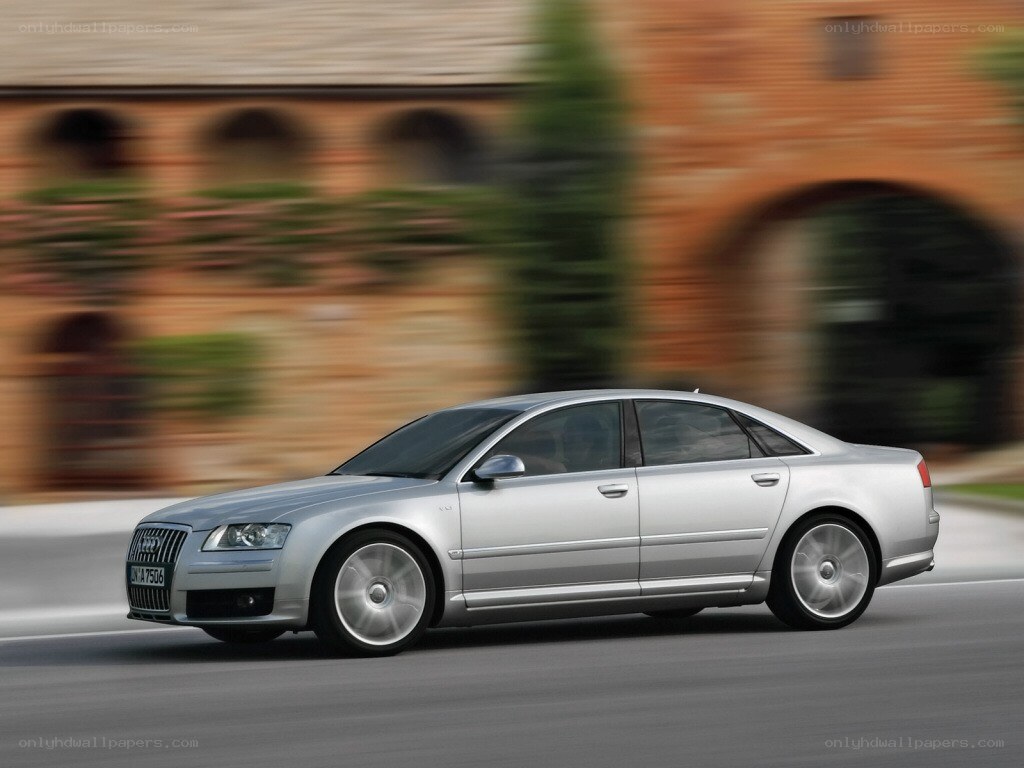 silver audi sedan in motion
