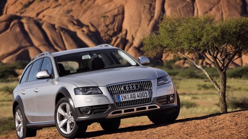 Silver Audi station wagon in desert