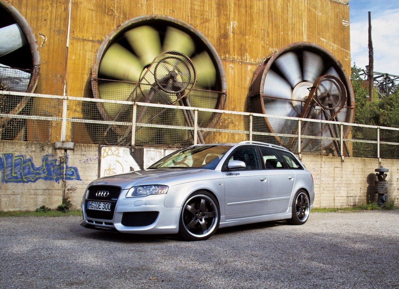 Silver Audi station wagon in industrial setting