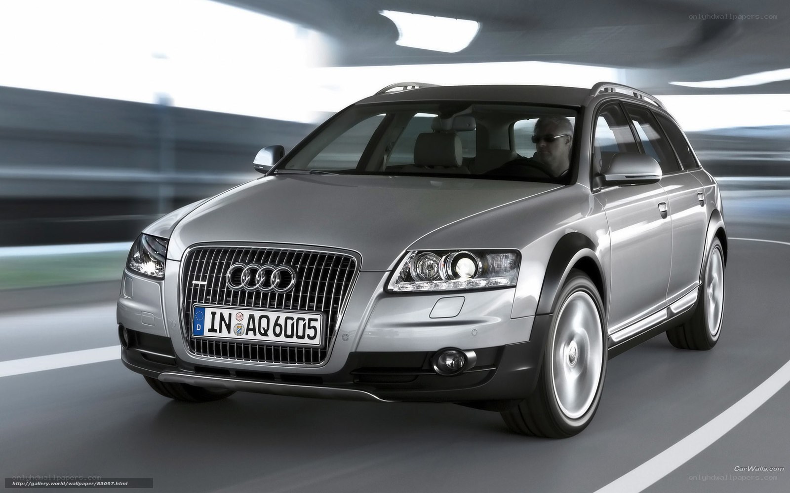 Silver Audi station wagon in motion
